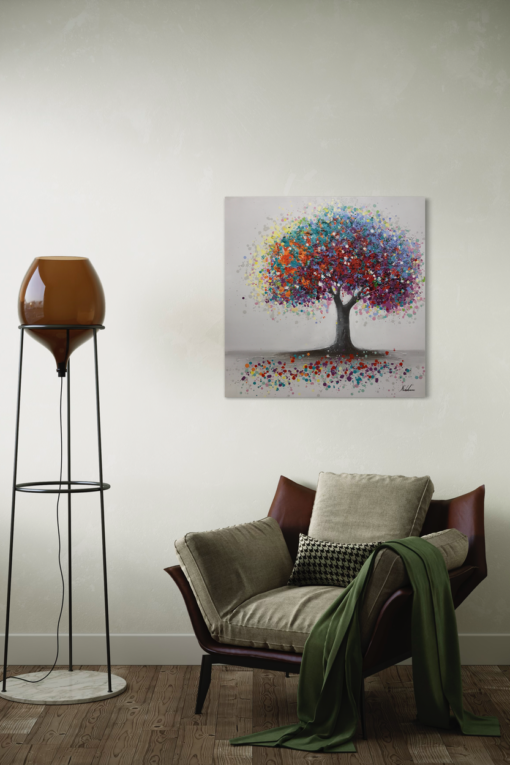 En målning med ett färgglatt träd.